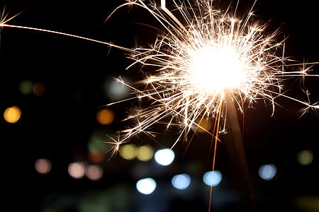 fire cracker in macro shot photography during nighttime thumbnail