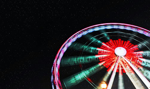 lighted ferris wheel during nighttime thumbnail