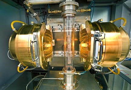 glass tube in between gold machine thumbnail