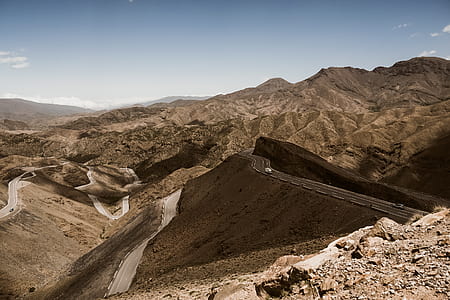 aerial photography of road on mountain range during daytime thumbnail