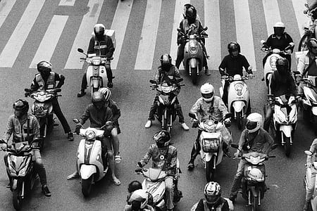 grayscale photography of people riding motorcycles on road thumbnail