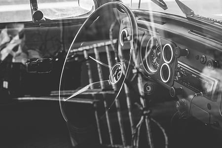 emtpy car in grayscale photography thumbnail