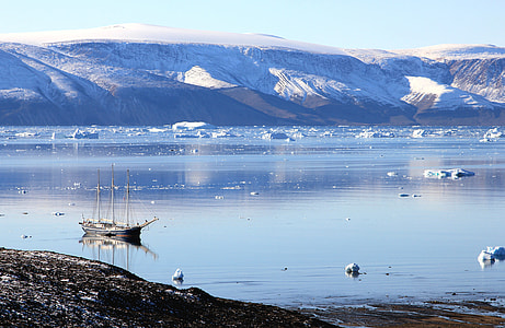 sail ship near glaciers thumbnail