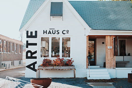 white and teal wooden house thumbnail