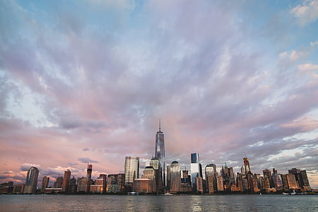 skyline photography of city buildings under blue sky at daytime thumbnail