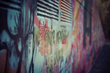 selective focus photography of multicolored graffiti thumbnail