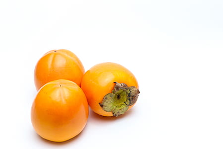 three persimmon fruits thumbnail