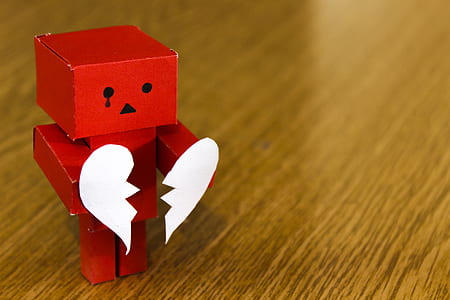 shallow focus photography of red box holding heart thumbnail