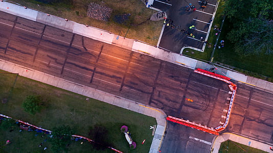 bird's eye view photography of gray concrete road thumbnail