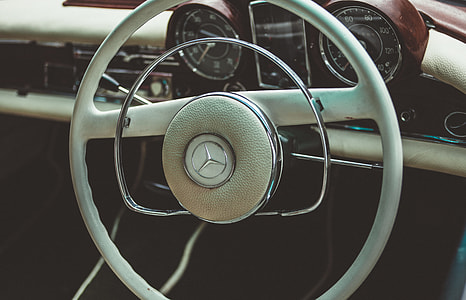 image contains close up photo of Mercedez Benz car steering wheel thumbnail
