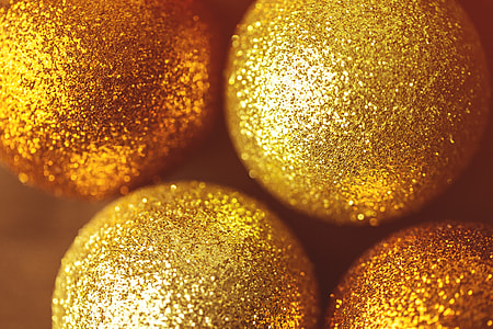 Closeup macro shot of golden Xmas glitter ball decorations. Image captured with a Canon 6D and 100m macro lens thumbnail