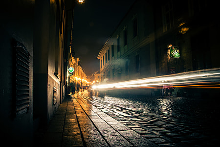 timelapse photography of people walking on sidewalk thumbnail