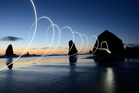 timelapse photography of light at beach thumbnail