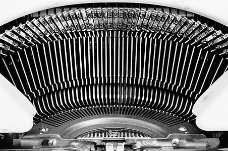 gray and white typewriter thumbnail