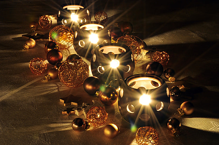 closeup photo of four black lighted candles thumbnail