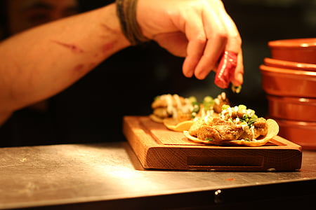 selective focus photography of soft taco on chopping board thumbnail