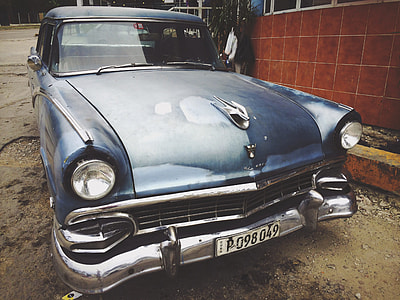 selective focus photography of classic blue vehicle thumbnail
