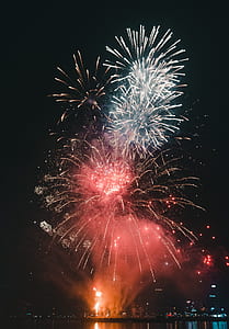 white and red fireworks during night time thumbnail