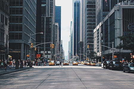 photo of taxis near buildings thumbnail