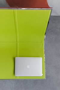 View from above at the laptop on the lime chair thumbnail