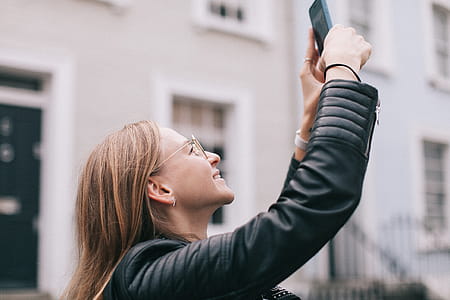 Woman Holding Smartphone thumbnail