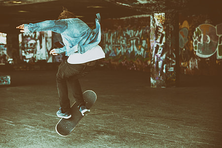 A skateboarder makes a jump at the Southbank by the River Thames in London, England thumbnail
