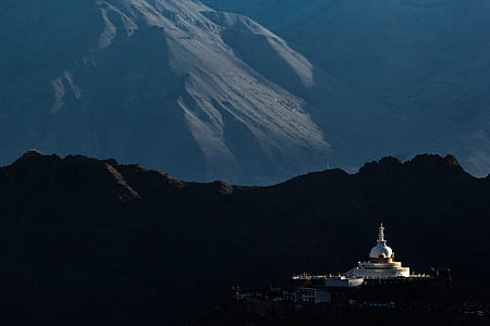 white mosque across mountains thumbnail