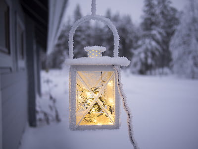 tilt shift lens photography of white lantern thumbnail