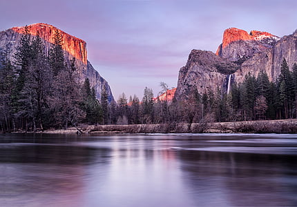 closeup photo of calm body of water under cloudy sky thumbnail