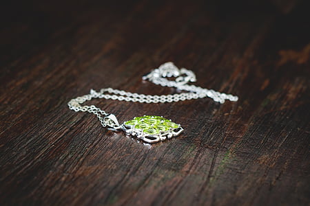 silver-colored green gemstone pendant necklace thumbnail