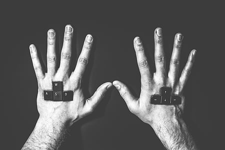 painting of eight keyboard keys on human hands thumbnail