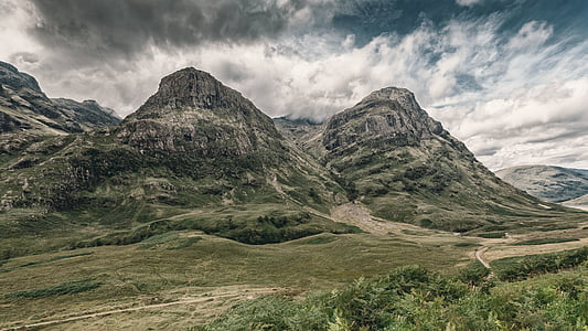 mountains and grass field thumbnail