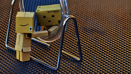 cardboard box robot facing mirror thumbnail