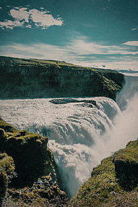 waterfalls during daytime thumbnail