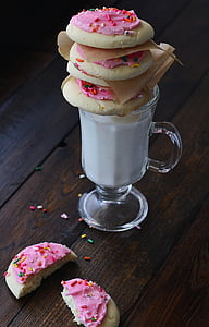 cookie on top of clear low footed cup with handle thumbnail