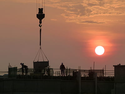 silhouette of tower during golden hour thumbnail