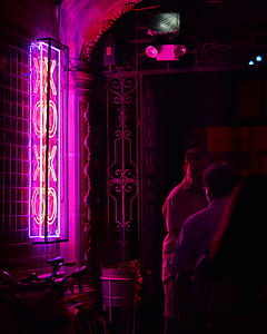purple neon light signboard on wall thumbnail