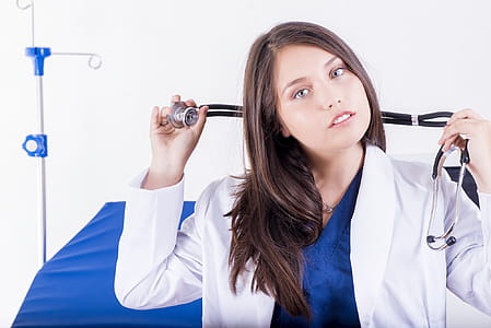 Woman Holding Black Stethoscope thumbnail