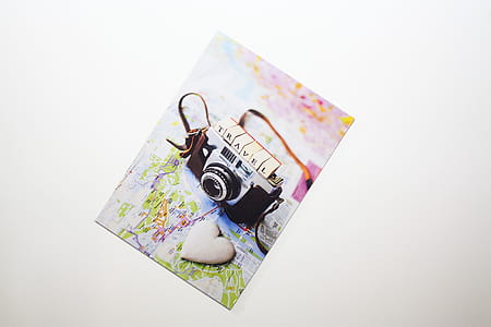 gray and black MILC camera near gray heart decor thumbnail