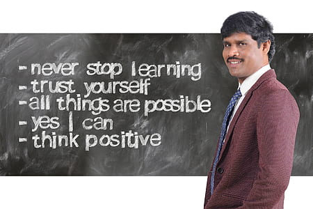 man wearing maroon suit jacket beside inspirational quote thumbnail