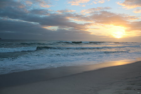 body of water beside sand thumbnail