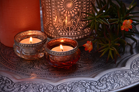 two brown steel candle holders on gray steel tray thumbnail