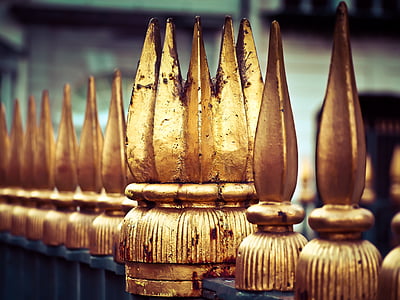 selective focus photo of brass-colored finial thumbnail