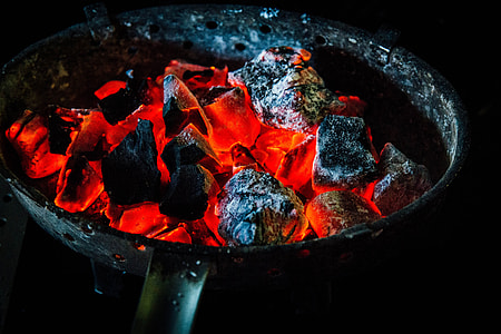 focus photography of charcoal burning on frying pan thumbnail