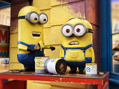 two minions on table thumbnail