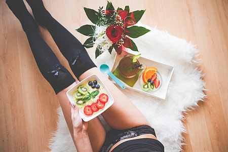 Young Woman with Her Morning Fresh & Healthy Breakfast thumbnail