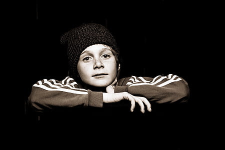 photo of boy in black knit cap and brown long-sleeved top thumbnail