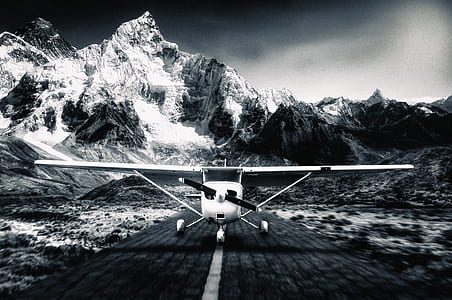 grayscale photography of monoplane thumbnail