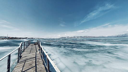 landscape photography of bridge and body of water thumbnail