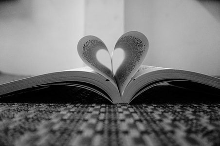 opened book grayscale photography thumbnail